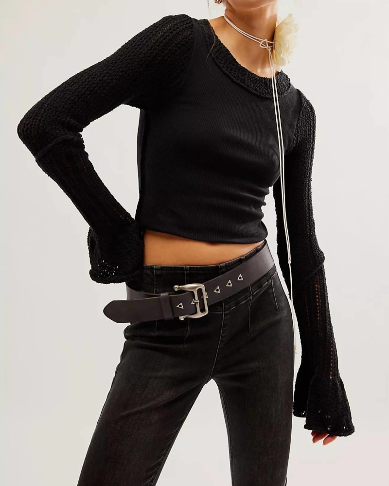 Front of a model wearing a size L Cuffing Season Top in Black in Black by Free People. | dia_product_style_image_id:343534